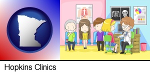 a clinic, showing a doctor and four patients in Hopkins, MN